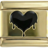 Cuore nero che si scioglie su base dorata